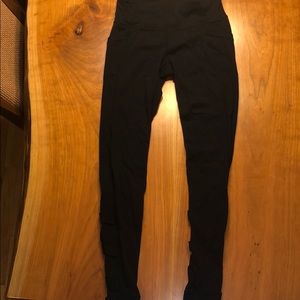 Athleta black leggings with criss cross on calves